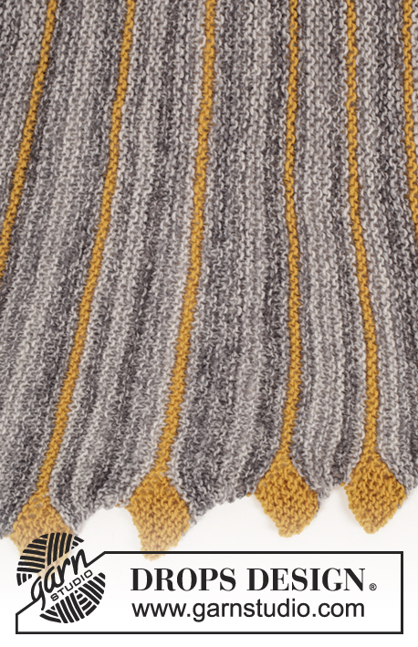 Dragon Tail / DROPS 173-19 - Knitted DROPS shawl in garter st with leaves, worked sideways in ”Fabel”.