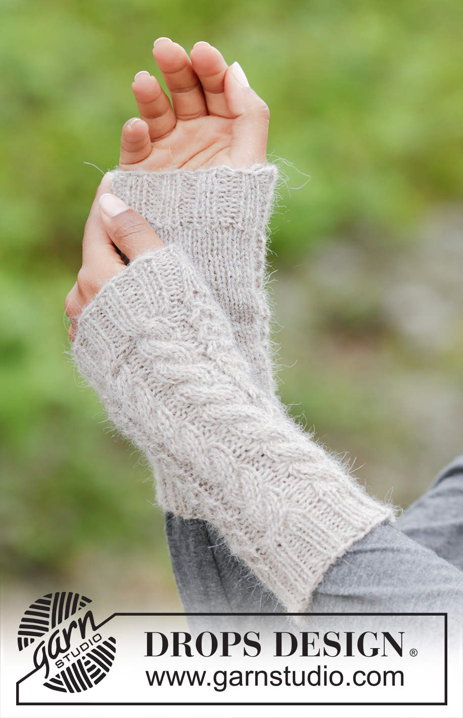 Winter Wired / DROPS 173-21 - Strikket DROPS hue, hals og pulsvanter i ”Puna” med snoninger.