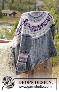 Telemark Jacket / DROPS 179-10 - Stickad kofta med runt ok och flerfärgat norskt mönster, stickad uppifrån och ner. Storlek S - XXXL. 
Arbetet är stickat i DROPS Merino Extra Fine.
