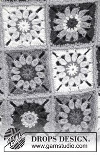 Margarita / DROPS 179-5 - Blanket with crochet squares. 
Piece is crocheted in DROPS Puna.