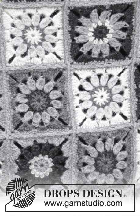 Margarita / DROPS 179-5 - Blanket with crochet squares. 
Piece is crocheted in DROPS Puna.