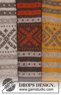 Nova Scotia Cardigan / DROPS 180-21 - Propínací svetr – kabátek s kruhovým sedlem a norským vzorem, rozšířený do A a pletený shora dolů z příze DROPS Karisma. Velikost: S - XXXL.