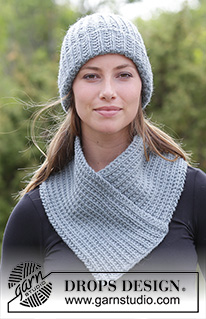 Warm Snap / DROPS 182-17 - The set consists of: Knitted hat/hipster hat, neck warmer and wrist warmers with textured pattern.
The set is knitted in DROPS Nepal.