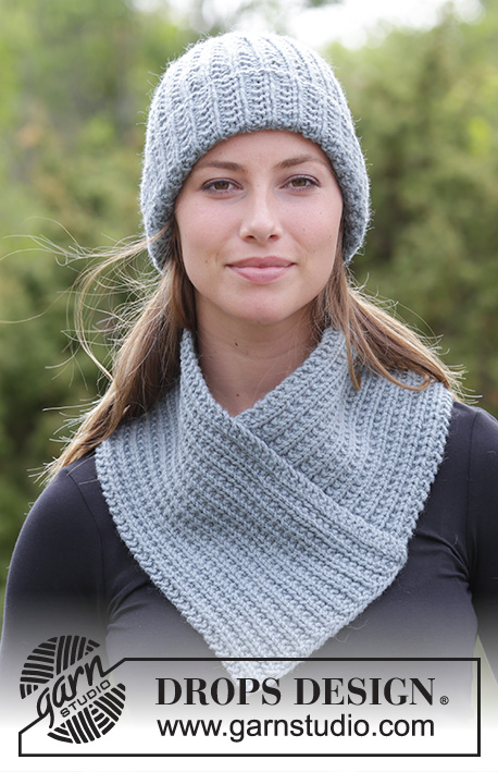 Warm Snap / DROPS 182-17 - The set consists of: Knitted hat/hipster hat, neck warmer and wrist warmers with textured pattern.
The set is knitted in DROPS Nepal.