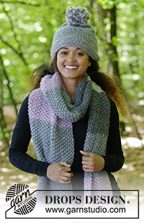 So Chill / DROPS 182-34 - The set consists of: Knitted scarf in seed stitch with fringe and hat with stripes in stockinette stitch and seed stitch.
The piece is worked in DROPS Snow.