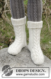 Snow Boots / DROPS 182-41 - Tøfler med fletter og vrangbord. Størrelse 35-42.
Arbeidet er strikket i DROPS Snow

