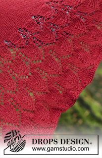 Fuego de Dragon / DROPS 183-17 - Kötött kendő csipkemintával kötött szegéllyel.
A darabot DROPS BabyAlpaca Silk fonalból készítjük.