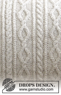 Morgan's Daughter Pillow / DROPS 183-34 - Gestrickter Kissenbezug mit Zopfmuster. Die Arbeit wird gestrickt in DROPS Flora.