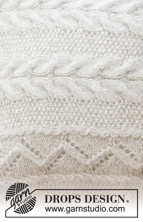 Elegant Comfort Pillow / DROPS 183-42 - Knitted pillow with seed stitch, cables and lace pattern. The piece is worked in DROPS Air.