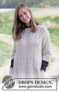 Elegant Comfort / DROPS 184-2 - Knitted jumper with seed stitch, cables, lace pattern and pockets. Sizes S - XXXL.
The piece is worked in DROPS Air.