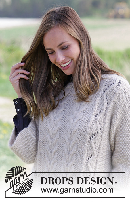 Elegant Comfort / DROPS 184-2 - Knitted jumper with seed stitch, cables, lace pattern and pockets. Sizes S - XXXL.
The piece is worked in DROPS Air.