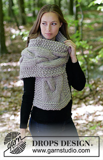 Noelia / DROPS 184-33 - Knitted scarf with cables and moss stitch.
Piece is knitted in DROPS Polaris.