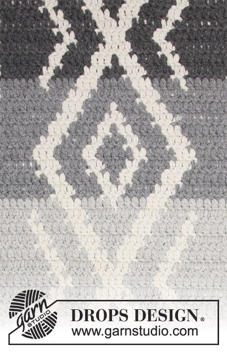 Grey Jacquard / DROPS 184-35 - Gehaakt vloerkleed met veelkleurig patroon.
Het werk wordt gehaakt in 2 draden DROPS Andes.