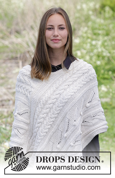 Winter's Heart / DROPS 184-5 - Gestrickter Poncho mit Zopfmuster, Noppen und Lochmuster. Größe S - XXXL.
Die Arbeit wird gestrickt in 2 Fäden DROPS BabyMerino.