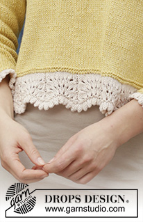 Adele / DROPS 187-14 - Gestrickter Pullover mit Rand im Wellenmuster und Seitenschlitzen. Größe S - XXXL. Die Arbeit wird gestrickt in DROPS Belle.