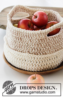 Can Can / DROPS 189-9 - Crochet basket with pom poms and tassels. The piece is worked with 2 strands DROPS Paris.
