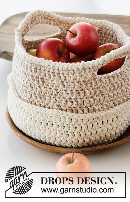 Can Can / DROPS 189-9 - Crochet basket with pom poms and tassels. The piece is worked with 2 strands DROPS Paris.