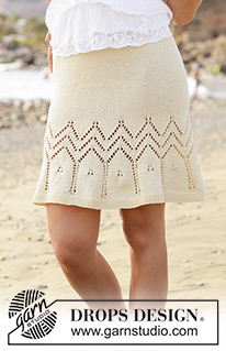 Embrace of the Sun Skirt / DROPS 190-31 - Rok met kantpatroon, gebreid van boven naar beneden. Maat: S - XXXL Het werk wordt gebreid in DROPS Muskat.