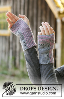 Horizon Highlights / DROPS 192-18 - Gebreide muts in DROPS BabyAlpaca Silk. Het werk wordt gebreid met kantpatroon, strepen en ribbelsteek.
Gebreide polswarmers in DROPS BabyAlpaca Silk. Het werk wordt gebreid met kantpatroon, strepen en ribbelsteek.