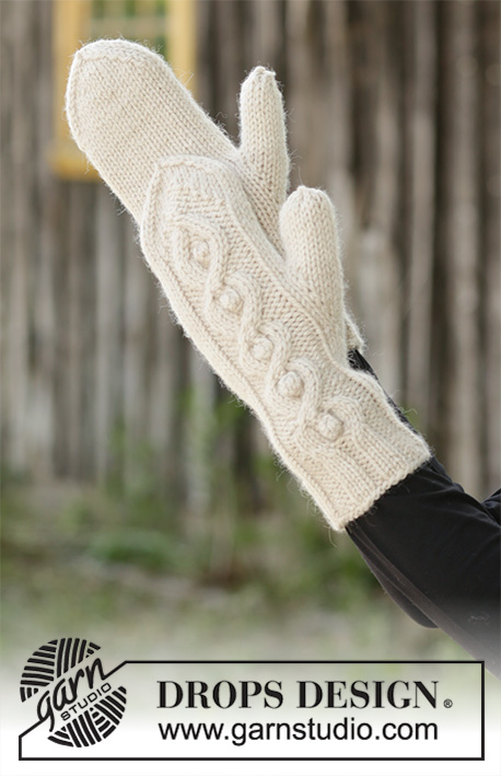 Snødrive / DROPS 192-56 - Knitted head band in DROPS Nepal. The piece is worked sideways with cables and bobbles. 
Knitted neck warmer in DROPS Nepal. The piece is worked with cables and bobbles. 
Knitted mittens in DROPS Nepal. The piece is worked with cables and bobbles.