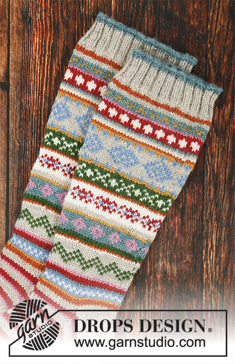 Winter Carnival Socks / DROPS 193-1 - Knitted socks in DROPS Karisma. The piece is worked with stripes and Nordic pattern. Sizes 35 - 46.