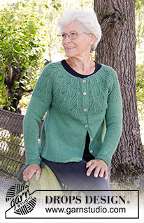 Green Echo Jacket / DROPS 196-27 - Knitted jacket with round yoke in DROPS Nord. The piece is worked with lace pattern and textured pattern. Sizes S – XXXL.