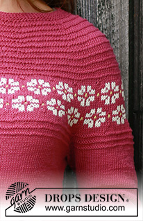 Daisy Delight Cardigan / DROPS 196-3 - Knitted jacket with round yoke in DROPS BabyMerino. Piece is knitted top down with Nordic pattern and garter stitch. Size: S - XXXL