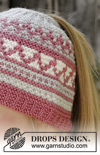 Hint of Heather Hat / DROPS 197-19 - Knitted hat in DROPS Nord. Piece is knitted bottom up in garter stitch, mosaic pattern and opening for ponytail.