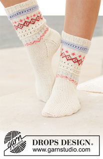 Relaxing in Reykjavik Socks / DROPS 198-17 - Knitted socks in DROPS Flora or DROPS Fabel. Piece is knitted top down with Nordic pattern. Size 35 to 43