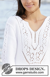 White Pearl / DROPS 199-2 - Knitted dress in DROPS Paris. The piece is worked with lace pattern, split in front of neck and ¾ length trumpet sleeves with lace pattern. Sizes S - XXXL.