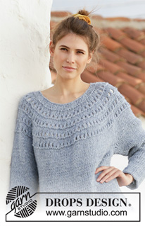April Showers / DROPS 201-32 - Knitted long jumper with round yoke in 2 strands DROPS Sky. The piece is worked top down with lace pattern. Sizes S - XXXL.