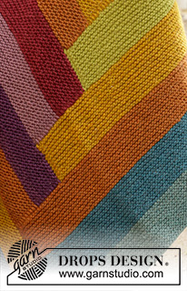 Abstract Rainbow / DROPS 203-2 - DROPS Snow lõngast kootud ripskoes mitmevärvilise vikerkaare triipudega tekk