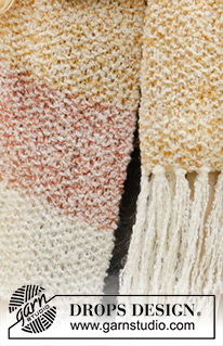 Long Run / DROPS 204-1 - Kötött sál rojtokkal DROPS Alpaca Bouclé és DROPS Kid Silk fonalból.
A darabot csíkokkal és rizsmintával kötjük.