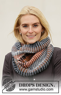 Lake Autumn Cozy / DROPS 204-4 - Knitted tube-shaped neck warmer in DROPS Sky. The piece is worked with 2-colored English rib and stripes.