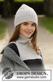Purity / DROPS 204-47 - Gebreide muts en halswarmer in DROPS BabyMerino. Het werk wordt gebreid met textuur.