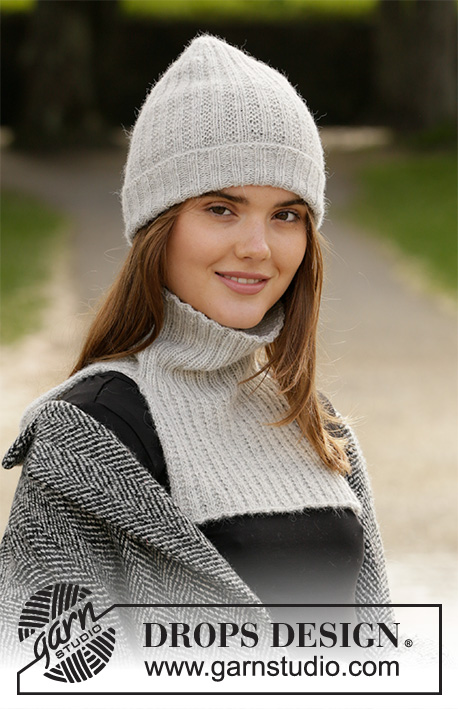 Purity / DROPS 204-47 - Gebreide muts en halswarmer in DROPS BabyMerino. Het werk wordt gebreid met textuur.