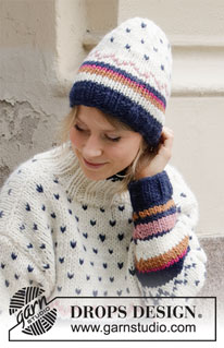 Winter Sunset Hat / DROPS 204-53 - Gestrickte Mütze mit Streifen und mehrfarbigem Muster in DROPS Snow.