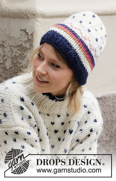 Winter Sunset Hat / DROPS 204-53 - Gestrickte Mütze mit Streifen und mehrfarbigem Muster in DROPS Snow.