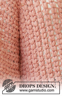 In Pieces / DROPS 205-40 - Crocheted poncho-sweater in DROPS Sky. The piece is worked with puff stitches, kimono-sleeves and split in sides. Sizes S - XXXL.