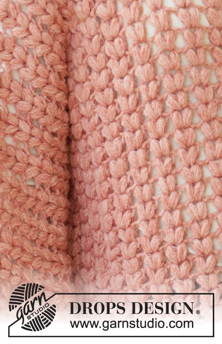 In Pieces / DROPS 205-40 - Crocheted poncho-sweater in DROPS Sky. The piece is worked with puff stitches, kimono-sleeves and split in sides. Sizes S - XXXL.