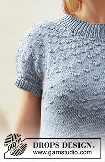 Enchanted Evening / DROPS 211-1 - Vestido de punto en DROPS Muskat. La pieza está tejida de arriba para abajo con canesú redondo, patrón de nudos y mangas cortas. Tallas S – XXXL.