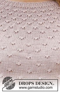 Dots and Drops / DROPS 213-9 - Strikket bluse i DROPS Muskat. Arbejdet strikkes oppefra og ned med rundt bærestykke, knudemønster og ¾ lange ærmer. Størrelse XS - XXL.