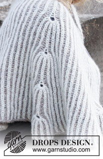 Spring Water / DROPS 214-19 - Knitted shawl in DROPS Air. The piece is worked top down with English rib in 2 colours.