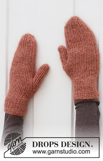 Blushing Fall / DROPS 214-2 - Knitted beanie / hipster hat and mittens in DROPS Alpaca and DROPS Kid-Silk. The piece is worked in rib.
