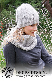 Whispering Wind / DROPS 214-45 - Crocheted hat and neck warmer in DROPS Sky and DROPS Kid-Silk. Piece is crocheted with loop - cables and relief stitches.