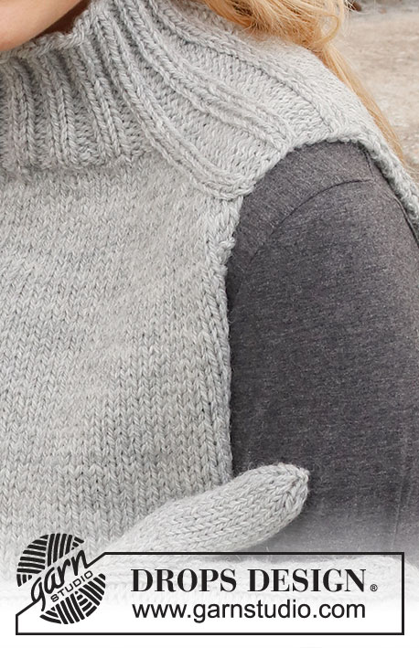 Winter Wisps Set / DROPS 214-49 - Gestricktes Stirnband, Kragenschal und Fäustling in DROPS Alaska. Die Arbeit wird mit Zopfmuster und Zunahmen für die Sattelschulter gestrickt.