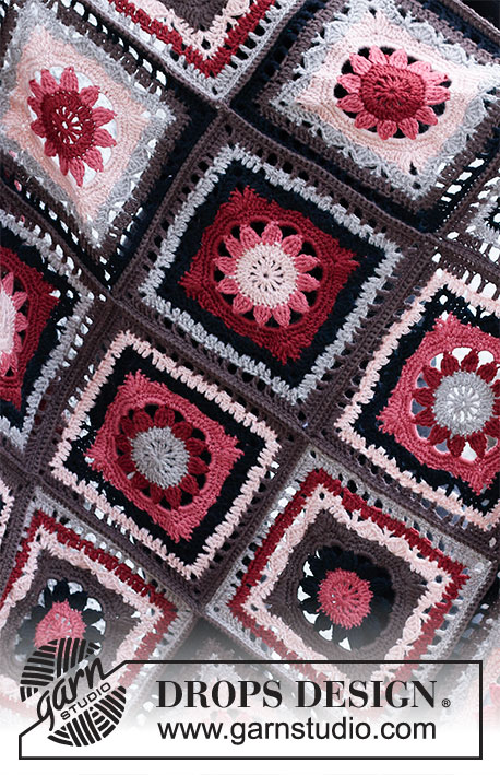 Chocolate Box / DROPS 214-5 - Heklet med pledd med blomster i DROPS Karisma. Arbeidet hekles i ruter som hekles sammen.