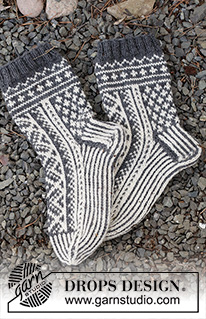 Sleigh Ride / DROPS 214-63 - Strikkede sokker i DROPS Lima. Arbejdet strikkes oppefra og ned med nordisk mønster. Størrelse 35 - 43. Tema: Jul
