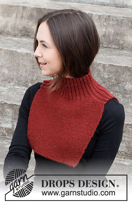 Roses so Red / DROPS 214-8 - Knitted hat and neck warmer with rib and cables in DROPS Karisma.