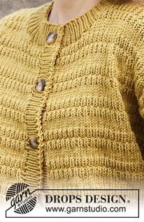Mustard Seeds Cardigan / DROPS 215-17 - Neulottu jakku DROPS Merino Extra Fine -langasta. Työssä on kohoneuletta. Koot S-XXXL.